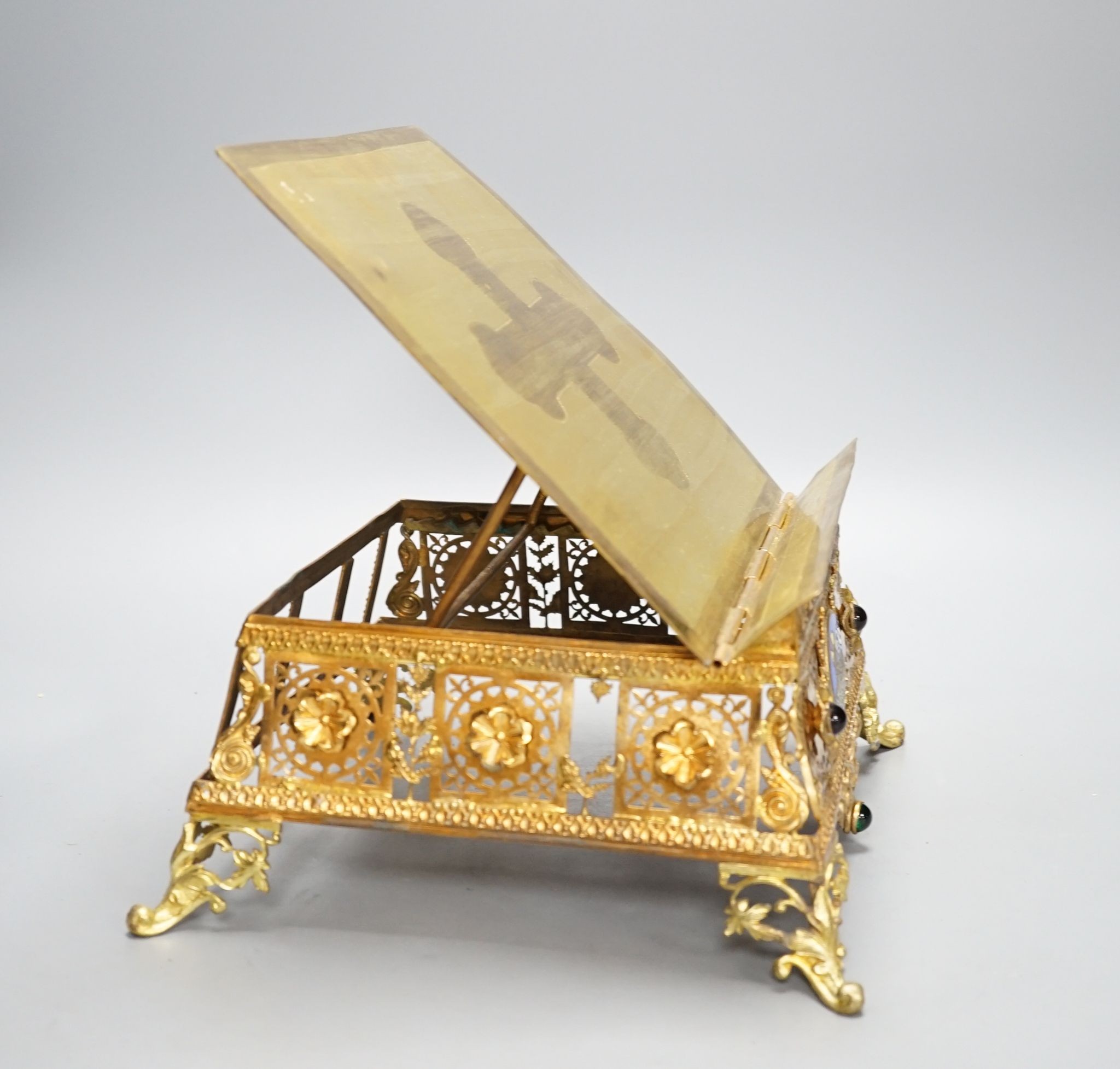 A 19th century gilt brass bible stand